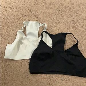 Two Aerie Racer back bras.